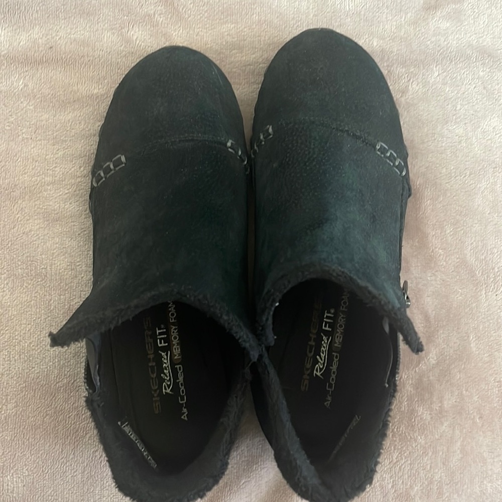 Black suede Skechers